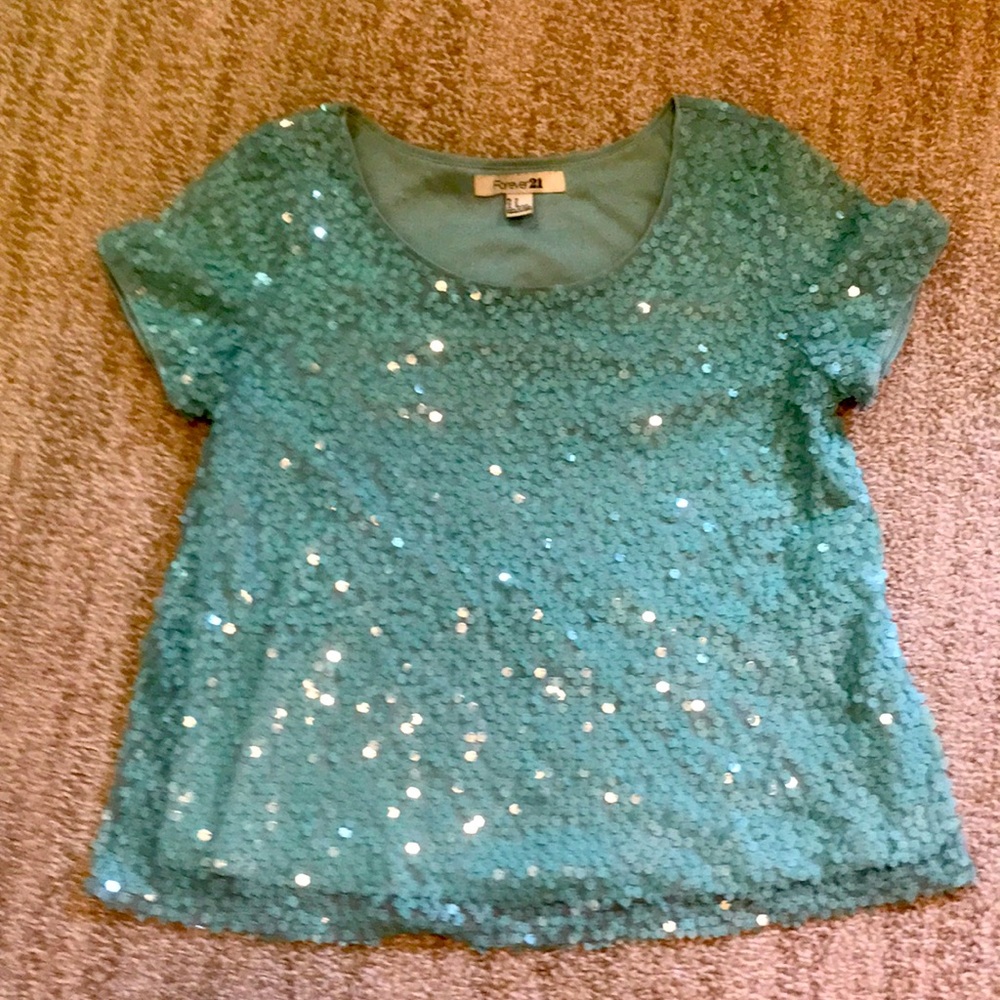 Pistashio colored sequins top.  Great condition